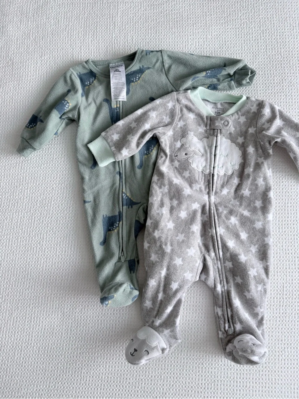 4-Pack Multi-Color Baby Fleece Footed Onesies- Dinosaur & Sheep Prints